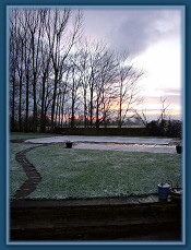Frosty pool at sunset